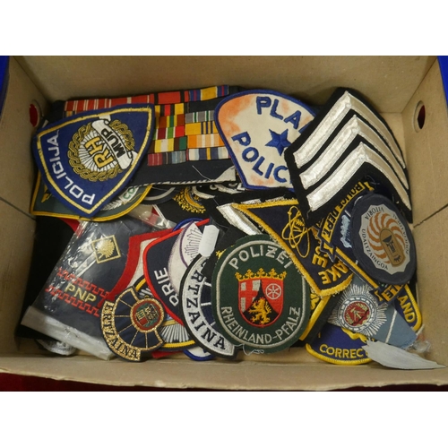 799 - BOX OF BADGES