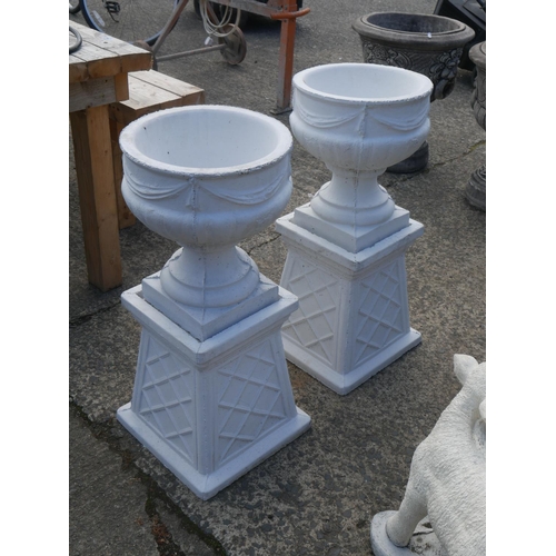 169 - PAIR OF CONCRETE PLANTERS ON PLINTHS