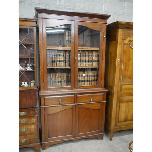 553 - ANTIQUE WALNUT 2 DOOR BOOKCASE