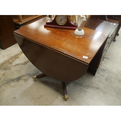 583 - BRASS TOE DROP LEAF TABLE