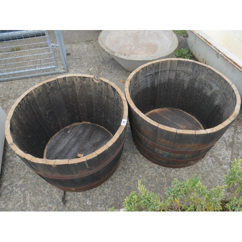 62 - 2 HALF BARREL PLANTERS