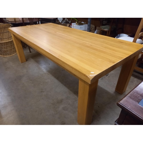 736 - HEAVY SOLID WOOD DINING TABLE