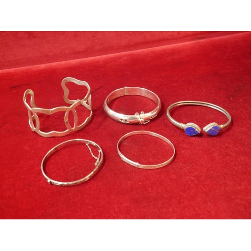 317 - LOT OF SILVER BANGLES