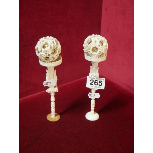 265 - PAIR OF BONE PUZZLE BALLS ON STANDS