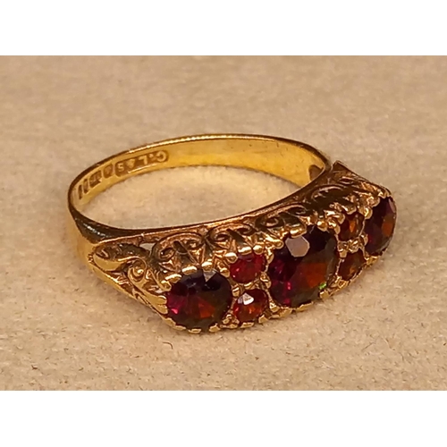 302 - 9CT & GARNET RING SIZE L