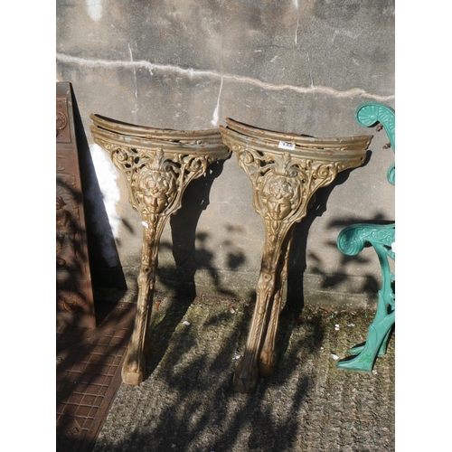 148 - 4 CAST IRON TABLE LEGS