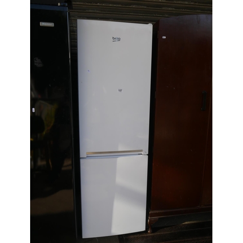 157 - FRIDGE FREEZER - NEEDS CLEANED