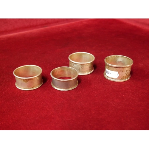 282 - 4 SILVER NAPKIN RINGS