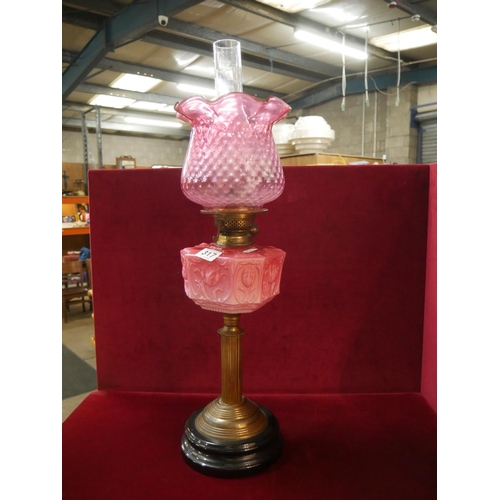 317 - MILK GLASS OIL LAMP WITH RUBY SHADE