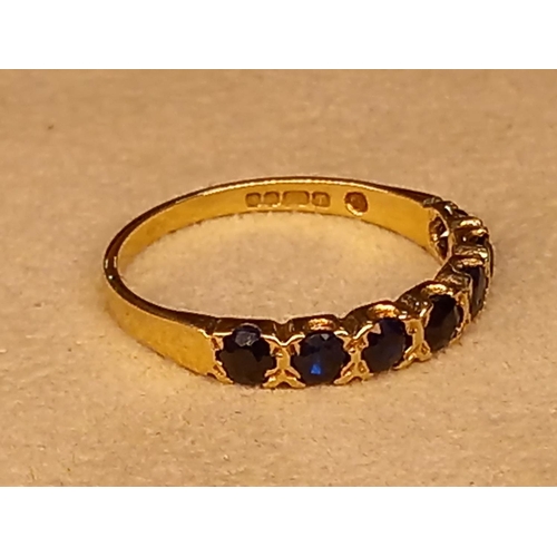 334 - 9CT SAPPHIRE ETERNITY RING SIZE M.1/2