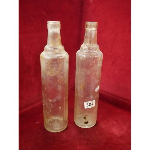 304 - 2 OIL SHELL BOTTLES