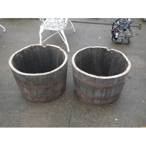 102 - PAIR OF HALF BARREL PLANTERS