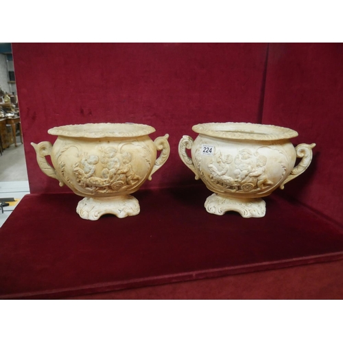 224 - PAIR OF PLASTER PLANTERS