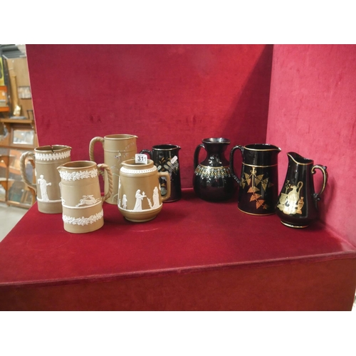 311 - SELECTION OF ANTIQUE JUGS