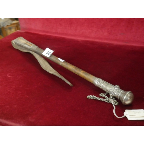 364 - LEATHER ON CANE RIDING CROP WITH PERUVIAN COIN DOMED ON SILVER