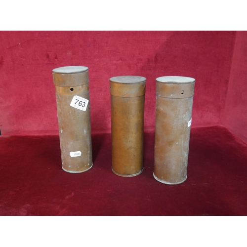 763 - OLD MILITARY CANISTERS