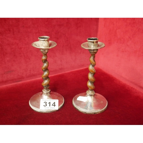 314 - PAIR OF SILVER & OAK CANDLESTICKS