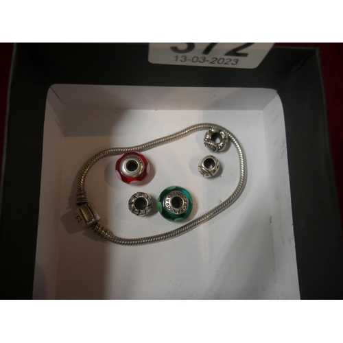 372 - SILVER BRACELET WITH SOME PANDORA CHARMS