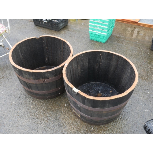 69 - 2 HALF BARREL PLANTERS