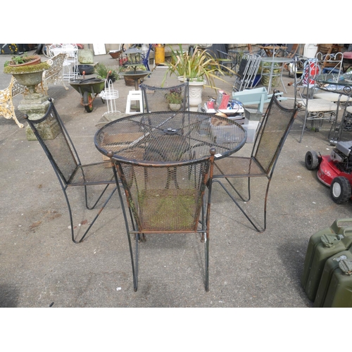 106 - WROUGHT IRON TABLE & 4 CHAIRS - NEEDS REPAINTED