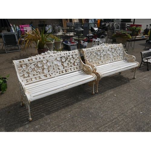 126 - PAIR OF HEAVY CAST IRON GARDEN SEATS