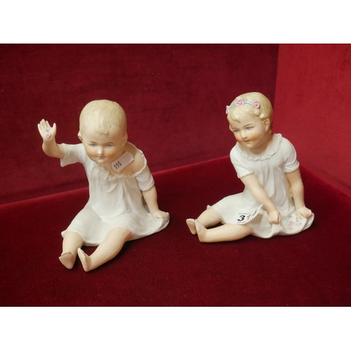 314 - PAIR OF BISQUE ANTIQUE PIANO BABIES