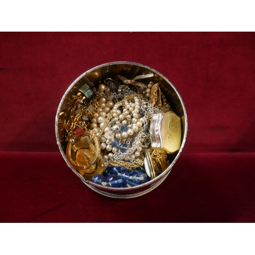 386 - TIN OF COSTUME JEWELLERY