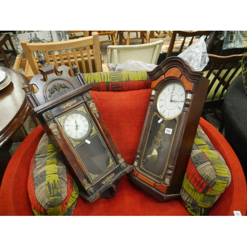 598 - 2 WALL CLOCKS