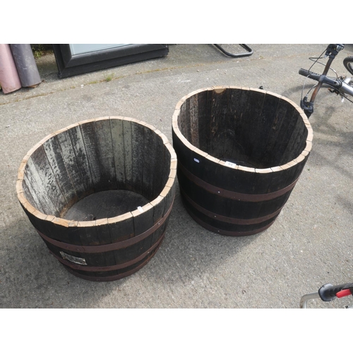 94 - 2 HALF BARREL PLANTERS