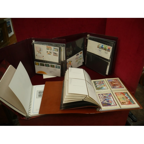 525 - 4 ALBUMS OF FIRST DAY COVERS