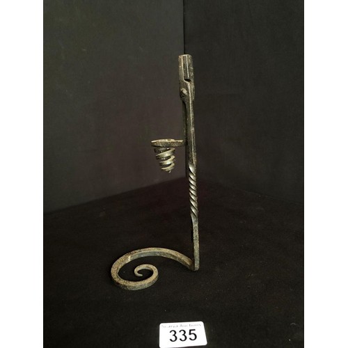 335 - ANTIQUE RUSH LIGHT WITH CANDLE HOLDER COUNTER WEIGHT, TWISTED STEM ON SWIRLED BASE