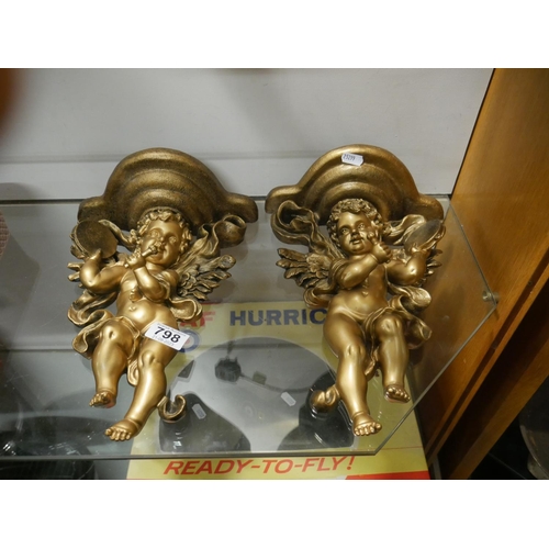 798 - Gilt cherub wall shelves