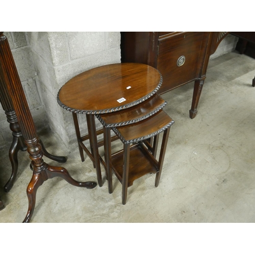 512 - 1920s MAHOGANY OVAL NEST OF TABLES