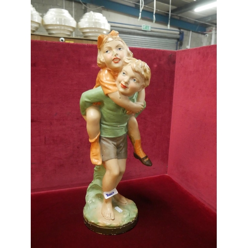 860 - ANTIQUE FIGURINE