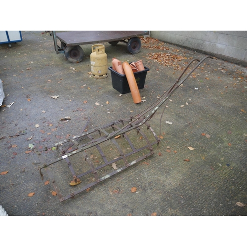 23 - 2 SADDLE BACK HARROWS