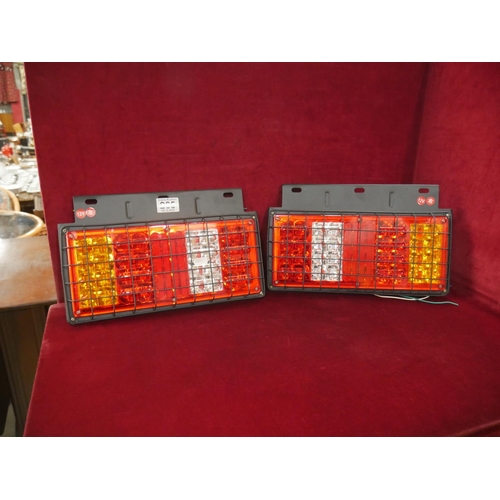 2 NEW TAIL LIGHT UNITS