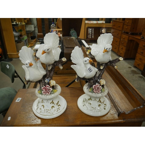 202 - PAIR OF CERAMIC DOVES