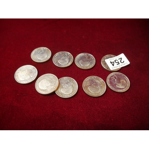 254 - 9 PRINCESS DIANA COMMEMORATIVE COINS