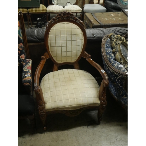 384 - LARGE CARVED OPEN ARMCHAIR