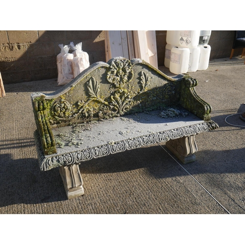 65 - LARGE AGED CONCRETE GARDEN BENCH WITH BACK