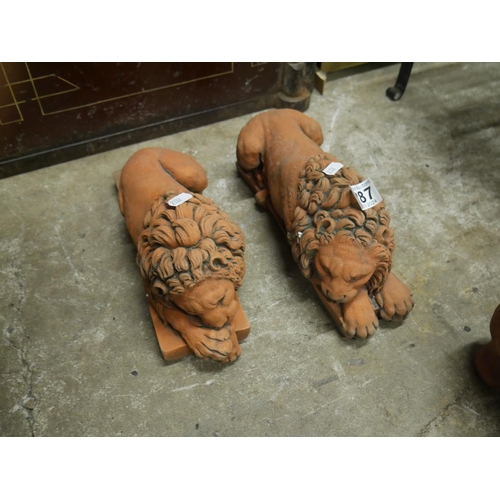 287 - PAIR OF TERRACOTTA STYLE LIONS