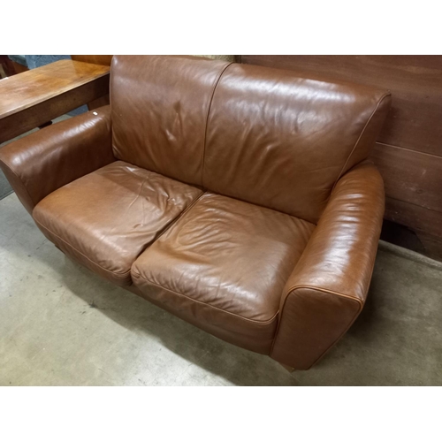 554 - LEATHER SETTEE