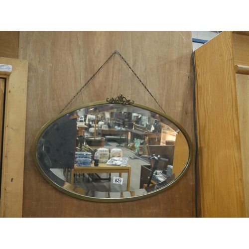 629 - BRASS FRAMED MIRROR