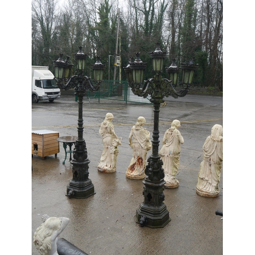 90 - PAIR OF 4 BRANCH CAST IRON STANDARD DRIVEWAY LAMPS APPROX 11' TALL