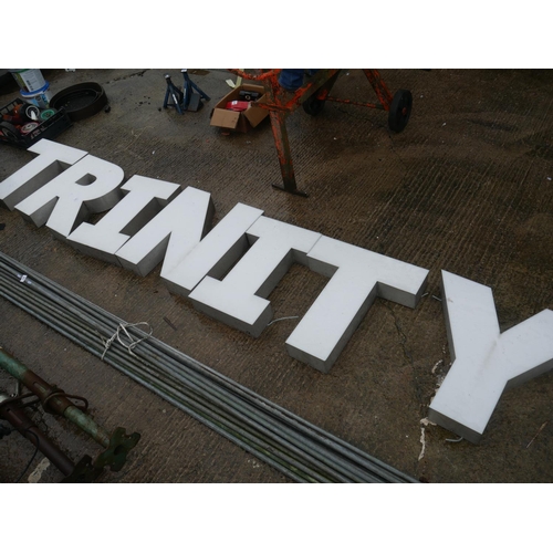 75 - T.R.I.N.I.T.Y. SIGN