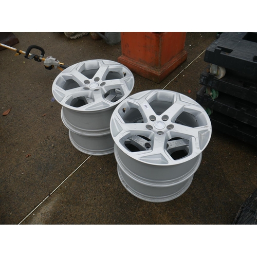 148 - 4 LAND ROVER DEFENDER ALLOYS - AS NEW