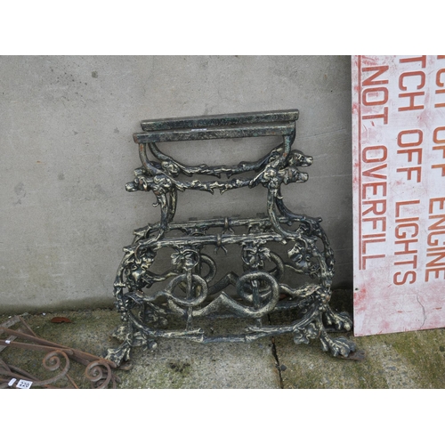 221 - PAIR OF CAST IRON TABLE ENDS