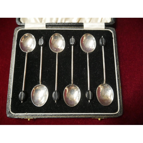 469 - 6 CASED SILVER COFFEE SPOONS