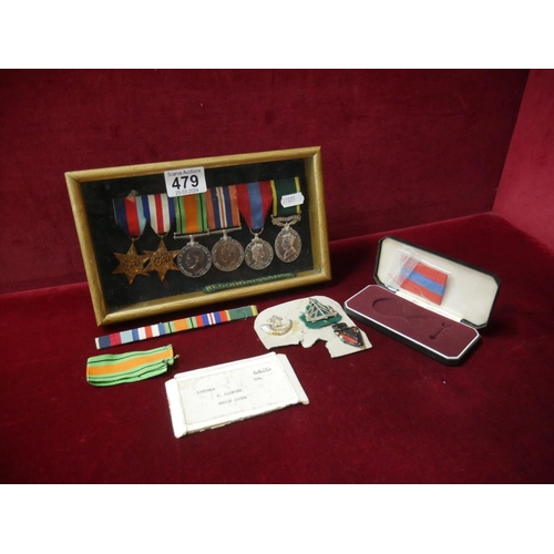 479 - DISPLAY CASE WITH WWII MEDALS & BADGES