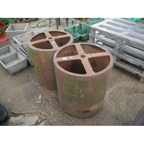 83 - 2 CAST ROLLER BARRELS